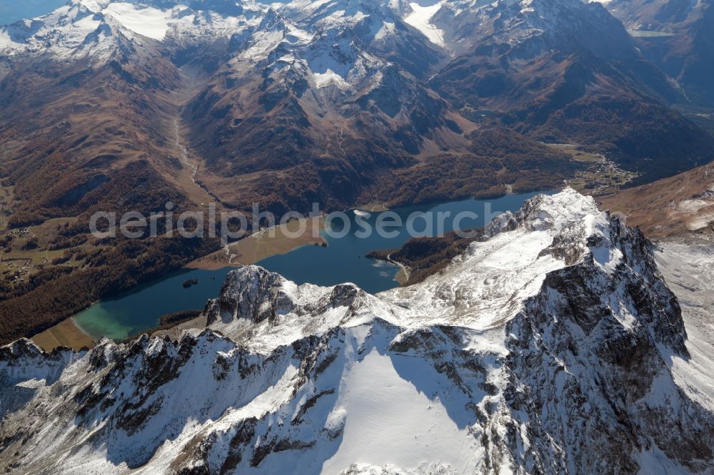 Aerial image Sils im Engadin/Segl - Snow covered mountains in the Swiss Alps and landscape with Silsersee and summit of Piz Lagrev in Sils in the Engadine in the canton of Grisons, Switzerland