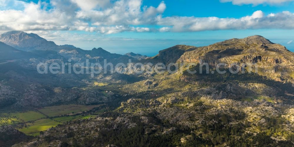 Escorca from the bird's eye view: Valley landscape surrounded by mountains in Escorca in Balearic island of Mallorca, Spain