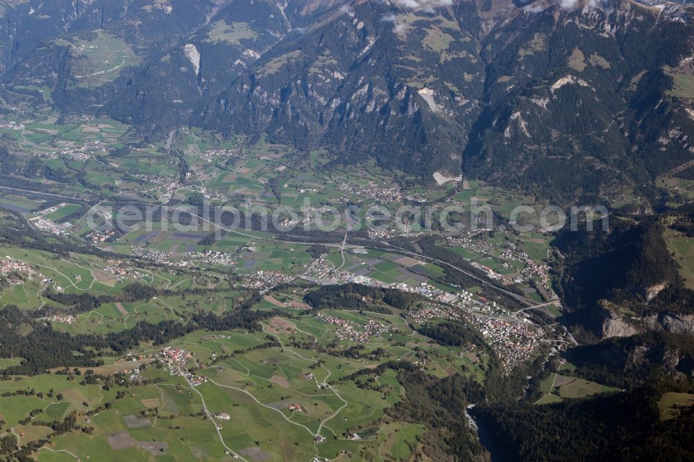 Thusis from above - Valley landscape surrounded by mountains of Hochrheintal in Thusis in the canton Graubuenden, Switzerland