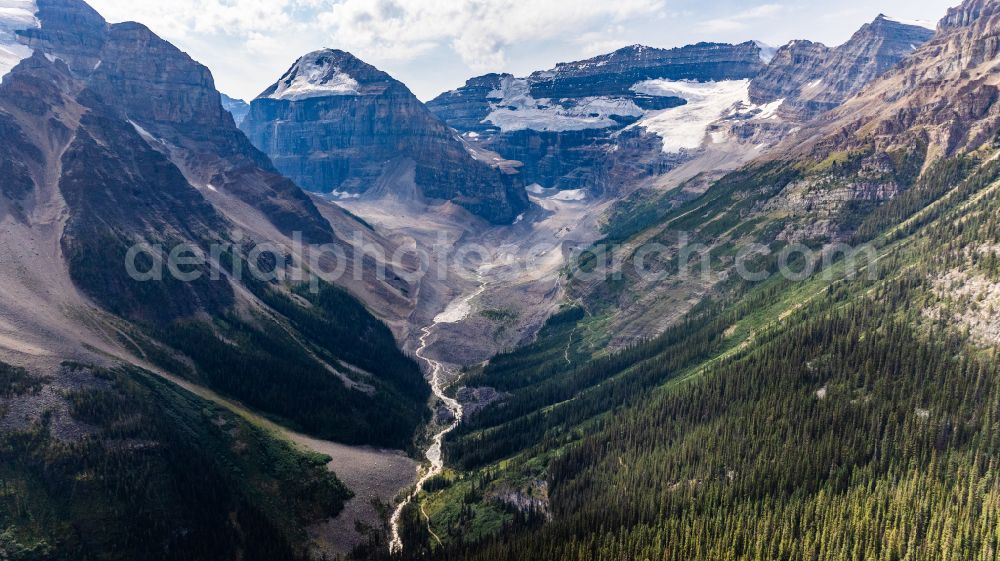 Aerial photograph Lake Louise - Valley landscape surrounded by mountains Plain of Six Glaciers Trail on street Plain of Six Glaciers in Lake Louise in Alberta, Canada