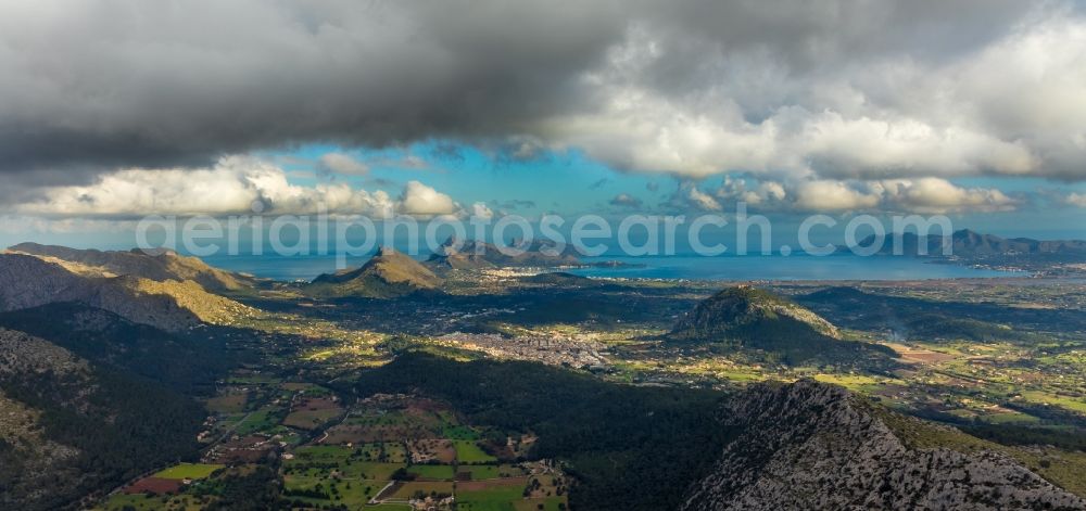 Aerial image Pollensa - Valley landscape surrounded by mountains in Pollensa in Islas Baleares, Spain