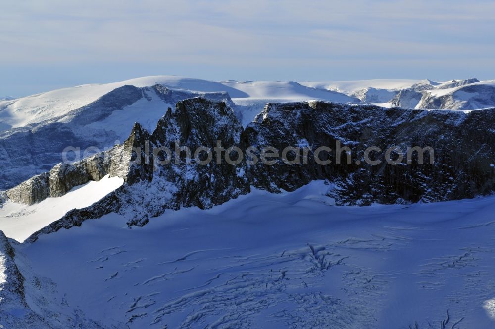 Aerial image Stryn - Snow- and ice-covered landscape in the national park Jostedalsbreen near Stryn in the Sogn og Fjordane county in Norway. Jostedalsbreen is Europe's largest mainland glacier. The nature reserve and national park of the same name shows the characteristic glacial landscape with its mountains and moraines