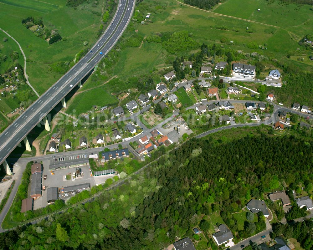 Dillenburg from above - Surrounded by forest and forest areas center of the streets and houses and residential areas in Dillenburg in the state Hesse, Germany