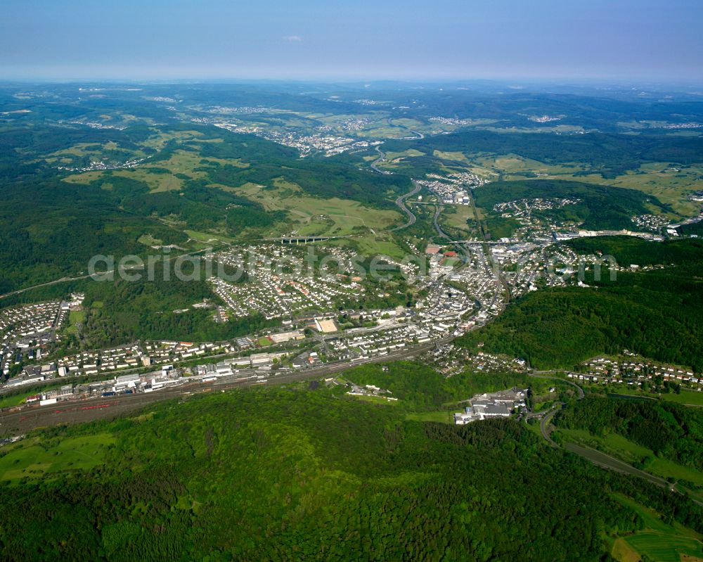 Dillenburg from above - Surrounded by forest and forest areas center of the streets and houses and residential areas in Dillenburg in the state Hesse, Germany