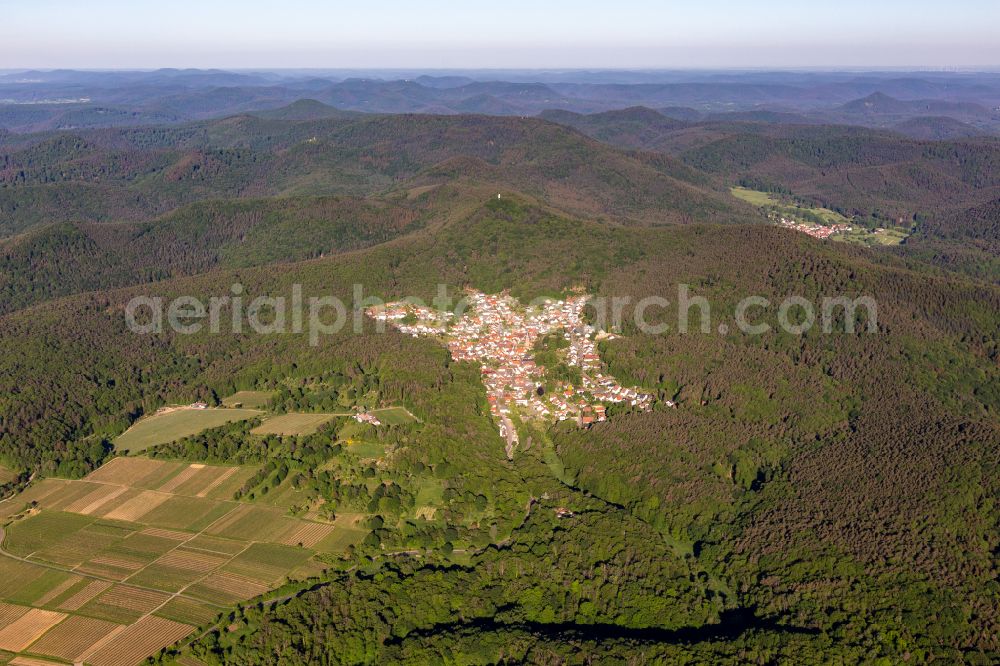 Dörrenbach from above - Surrounded by forest and forest areas center of the streets and houses and residential areas on street Hauptstrasse in Doerrenbach in the Palatinate Forest in the state Rhineland-Palatinate, Germany