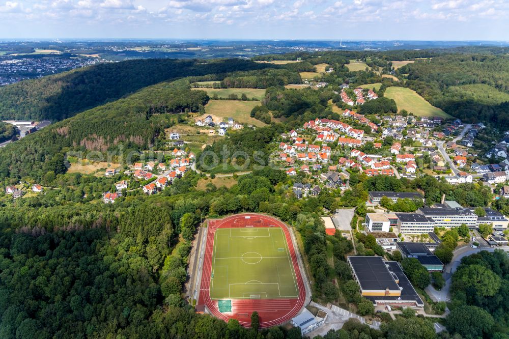 Ennepetal from above - Surrounded by forest and forest areas center of the streets and houses and residential areas in Ennepetal in the state North Rhine-Westphalia, Germany