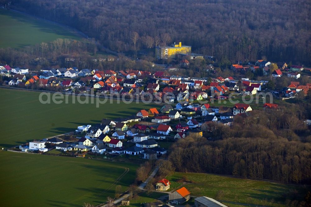 Aerial image Ettersburg - Surrounded by forest and forest areas center of the streets and houses and residential areas in Ettersburg in the state Thuringia, Germany