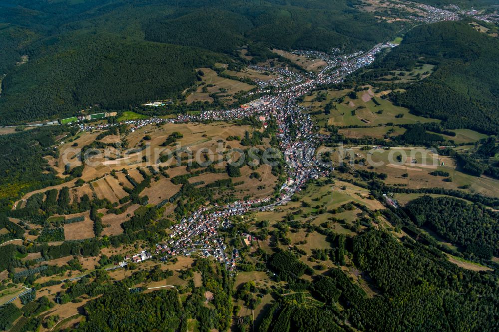 Frammersbach from the bird's eye view: Surrounded by forest and forest areas center of the streets and houses and residential areas in Frammersbach in the state Bavaria, Germany