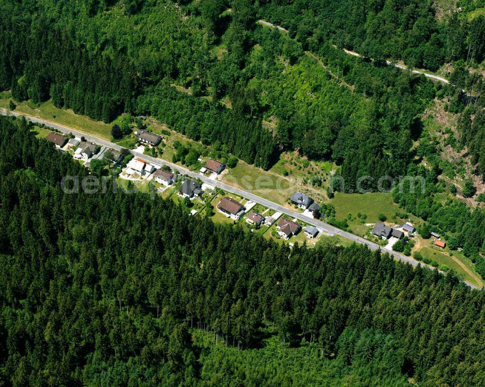 Geroldsgrün from the bird's eye view: Surrounded by forest and forest areas center of the streets and houses and residential areas on street Langenbachtal in the district Duerrenwaid in Geroldsgruen in the state Bavaria, Germany