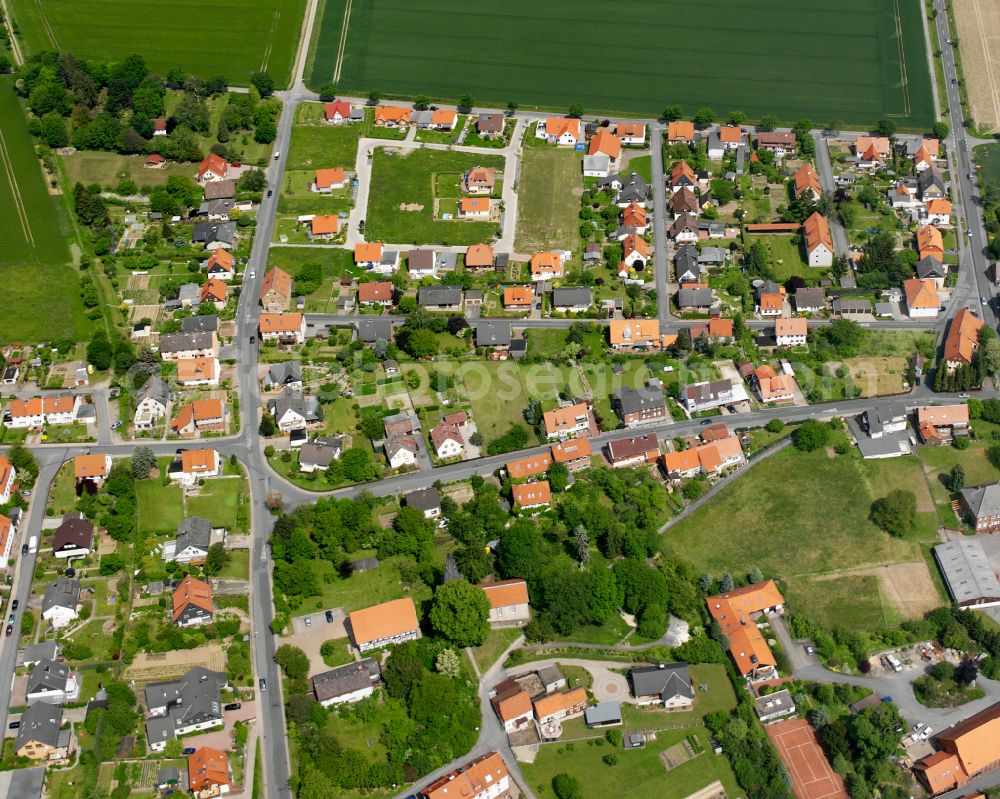 Aerial image Groß Döhren - Surrounded by forest and forest areas center of the streets and houses and residential areas in Groß Döhren in the state Lower Saxony, Germany