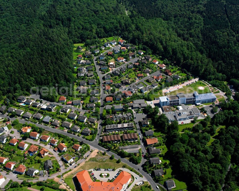 Aerial image Hann. Münden - Surrounded by forest and forest areas center of the streets and houses and residential areas in Hann. Muenden in the state Lower Saxony, Germany