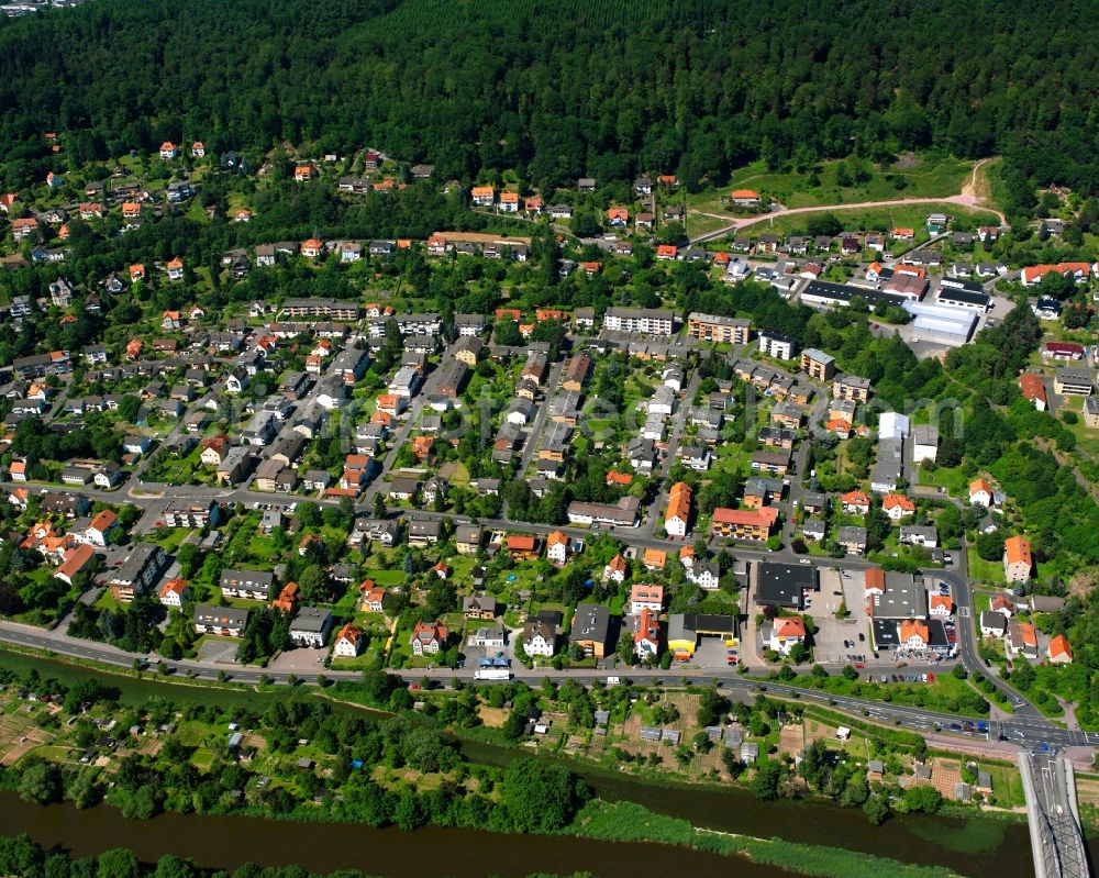 Hann. Münden from above - Surrounded by forest and forest areas center of the streets and houses and residential areas in Hann. Muenden in the state Lower Saxony, Germany