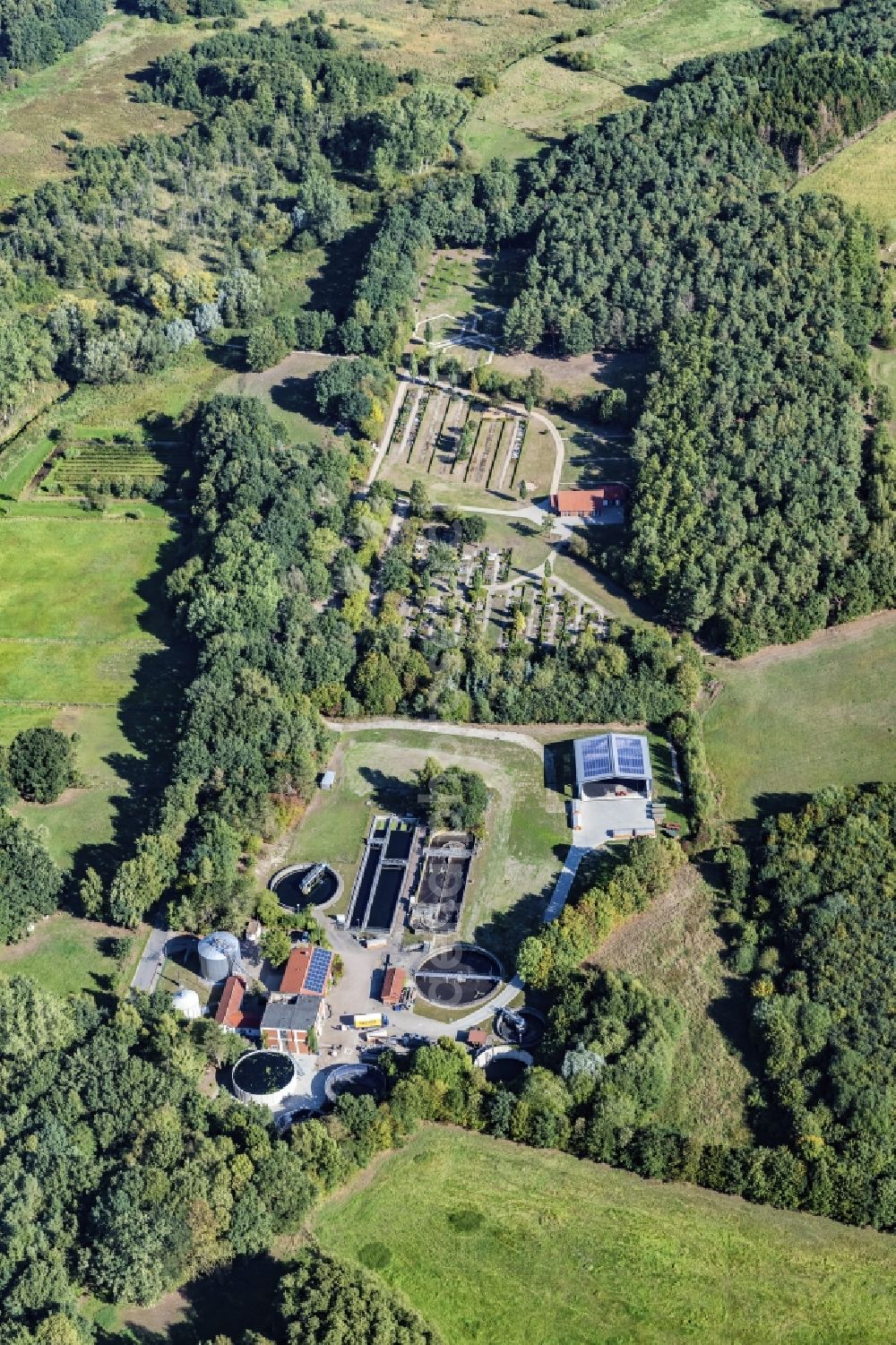 Aerial image Harsefeld - Surrounded by forest and forest areas center of the streets and houses and residential areas in Harsefeld Ehrenberg in the state Lower Saxony, Germany