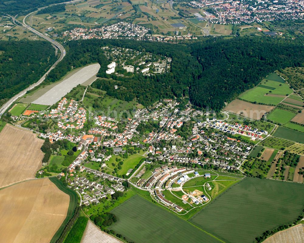 Aerial photograph Hohenwettersbach - Surrounded by forest and forest areas center of the streets and houses and residential areas in Hohenwettersbach in the state Baden-Wuerttemberg, Germany