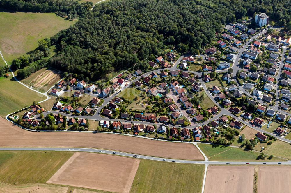 Kreuzwertheim from above - Surrounded by forest and forest areas center of the streets and houses and residential areas in Kreuzwertheim in the state Bavaria, Germany