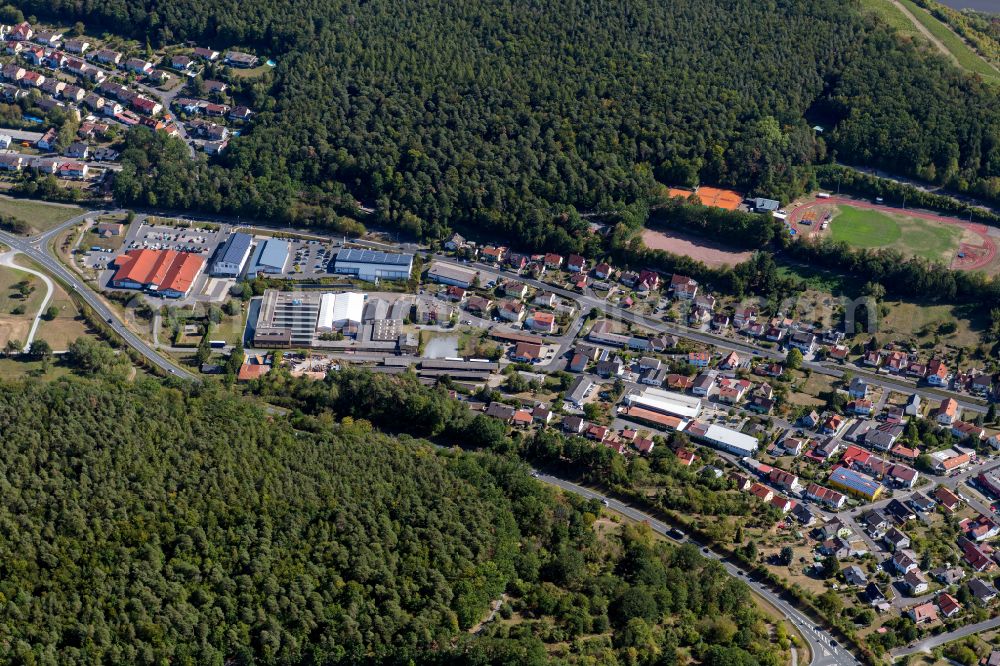 Kreuzwertheim from above - Surrounded by forest and forest areas center of the streets and houses and residential areas in Kreuzwertheim in the state Bavaria, Germany