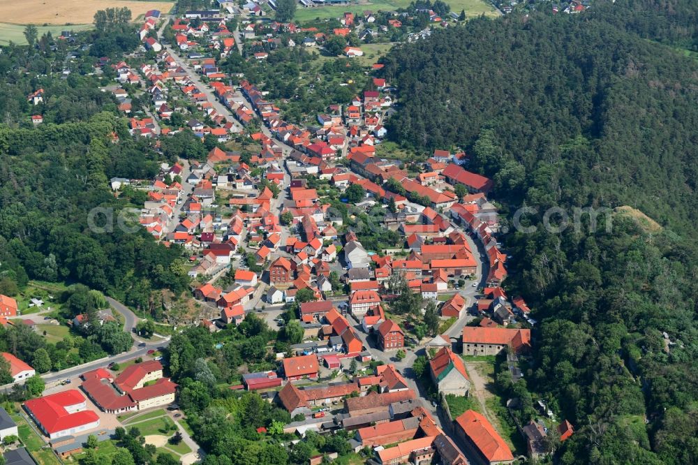 Langenstein from above - Surrounded by forest and forest areas center of the streets and houses and residential areas in Langenstein in the state Saxony-Anhalt, Germany