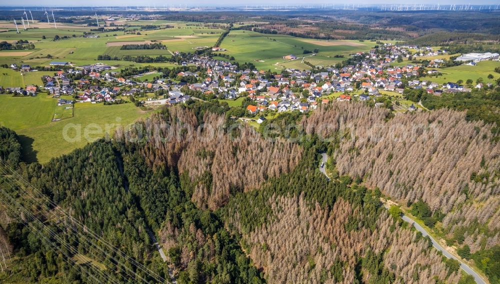 Madfeld from above - Surrounded by forest and forest areas center of the streets and houses and residential areas in Madfeld in the state North Rhine-Westphalia, Germany