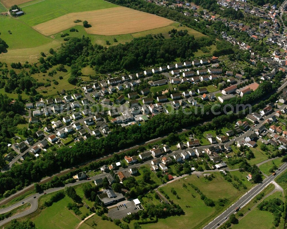 Nahbollenbach from above - Surrounded by forest and forest areas center of the streets and houses and residential areas in Nahbollenbach in the state Rhineland-Palatinate, Germany