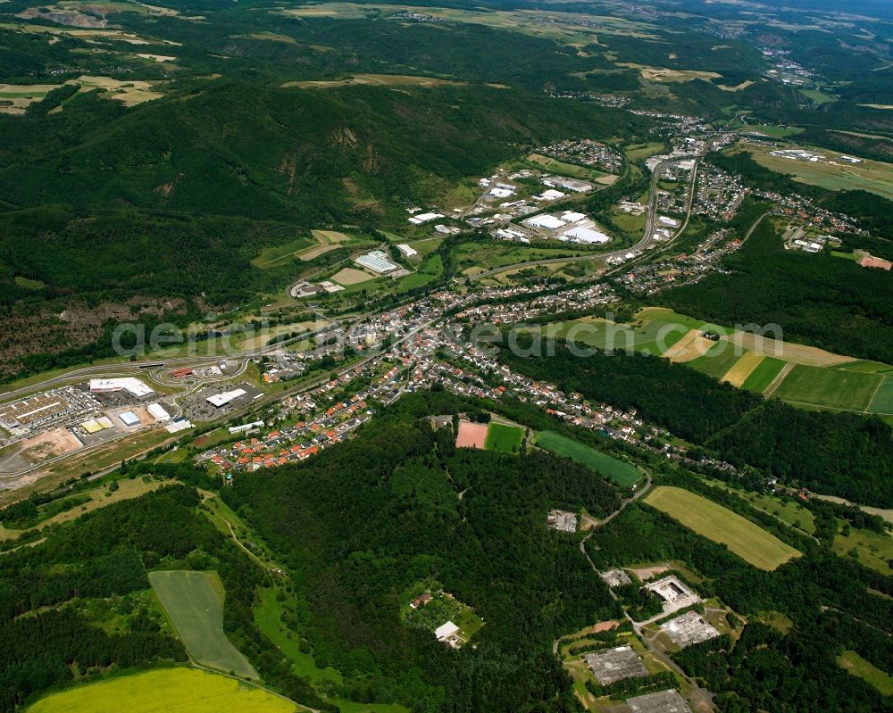 Nahbollenbach from above - Surrounded by forest and forest areas center of the streets and houses and residential areas in Nahbollenbach in the state Rhineland-Palatinate, Germany