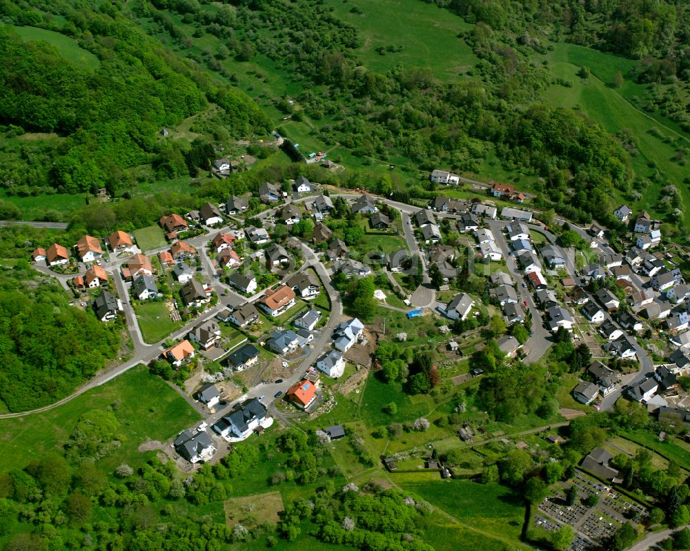 Nanzenbach from above - Surrounded by forest and forest areas center of the streets and houses and residential areas in Nanzenbach in the state Hesse, Germany