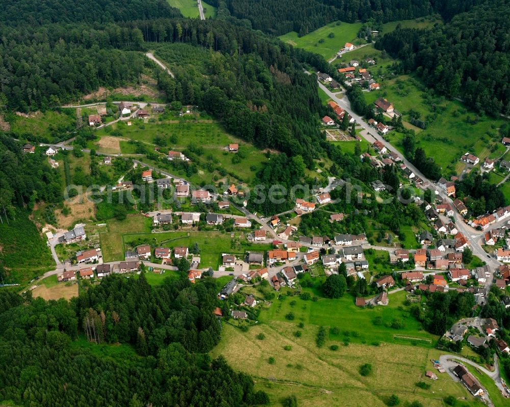 Aerial photograph Neulautern - Surrounded by forest and forest areas center of the streets and houses and residential areas in Neulautern in the state Baden-Wuerttemberg, Germany