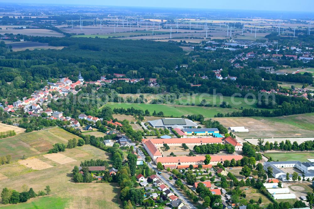 Neustadt (Dosse) from above - Surrounded by forest and forest areas center of the streets and houses and residential areas in Neustadt (Dosse) in the state Brandenburg, Germany