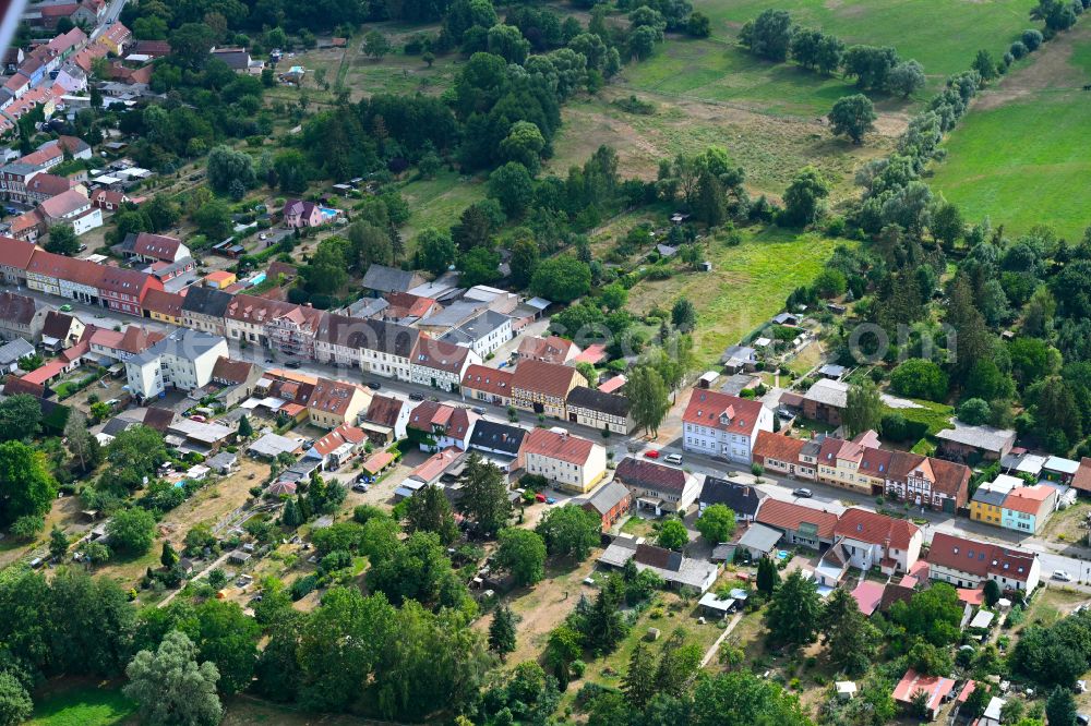 Neustadt (Dosse) from above - Surrounded by forest and forest areas center of the streets and houses and residential areas in Neustadt (Dosse) in the state Brandenburg, Germany