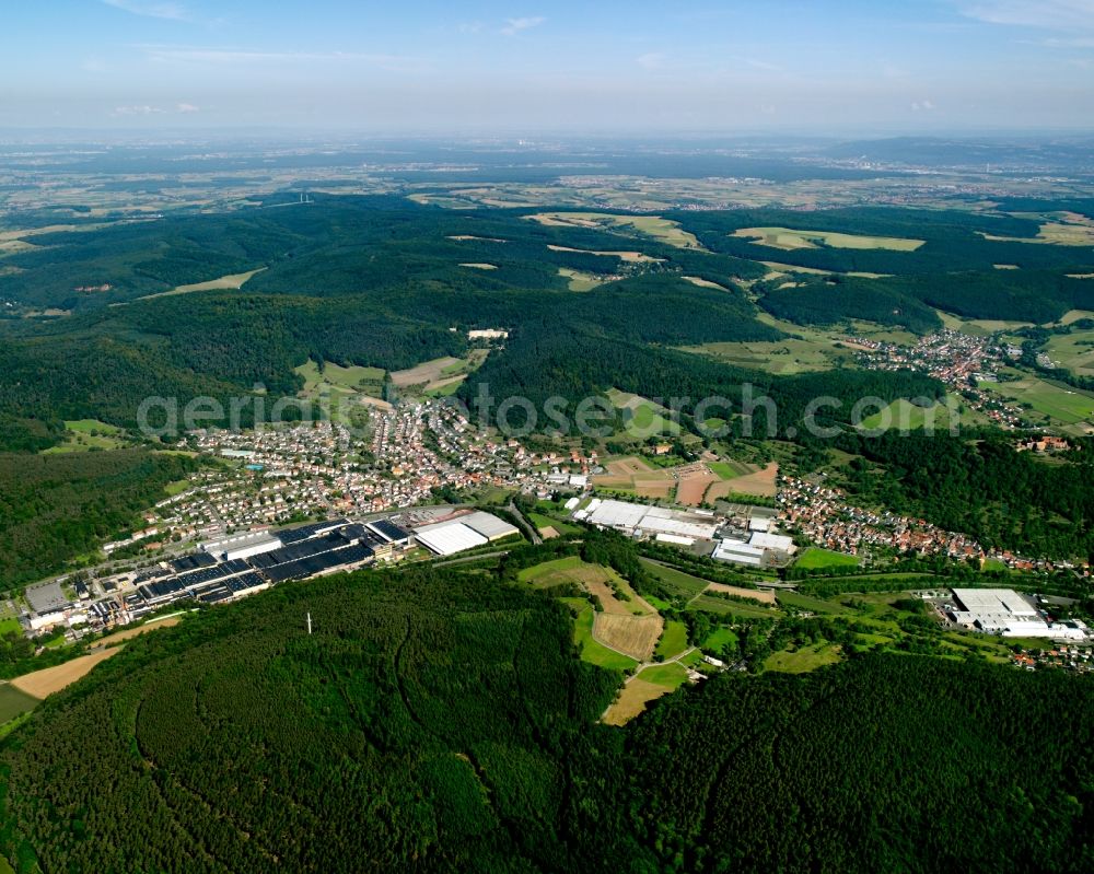 Aerial image Neustadt - Surrounded by forest and forest areas center of the streets and houses and residential areas in Neustadt in the state Hesse, Germany