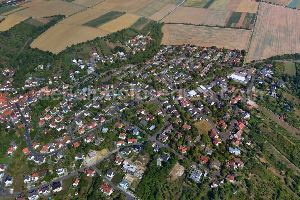 Oberdürrbach from above - Surrounded by forest and forest areas center of the streets and houses and residential areas in Oberdürrbach in the state Bavaria, Germany