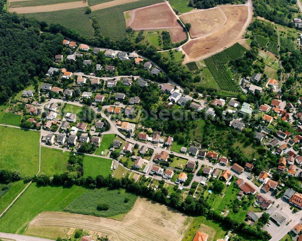 Oberheinriet from above - Surrounded by forest and forest areas center of the streets and houses and residential areas in Oberheinriet in the state Baden-Wuerttemberg, Germany