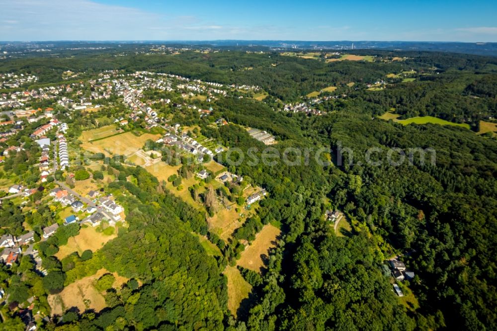 Witten from the bird's eye view: Surrounded by forest and forest areas center of the streets and houses and residential areas in the district Borbach in Witten in the state North Rhine-Westphalia, Germany