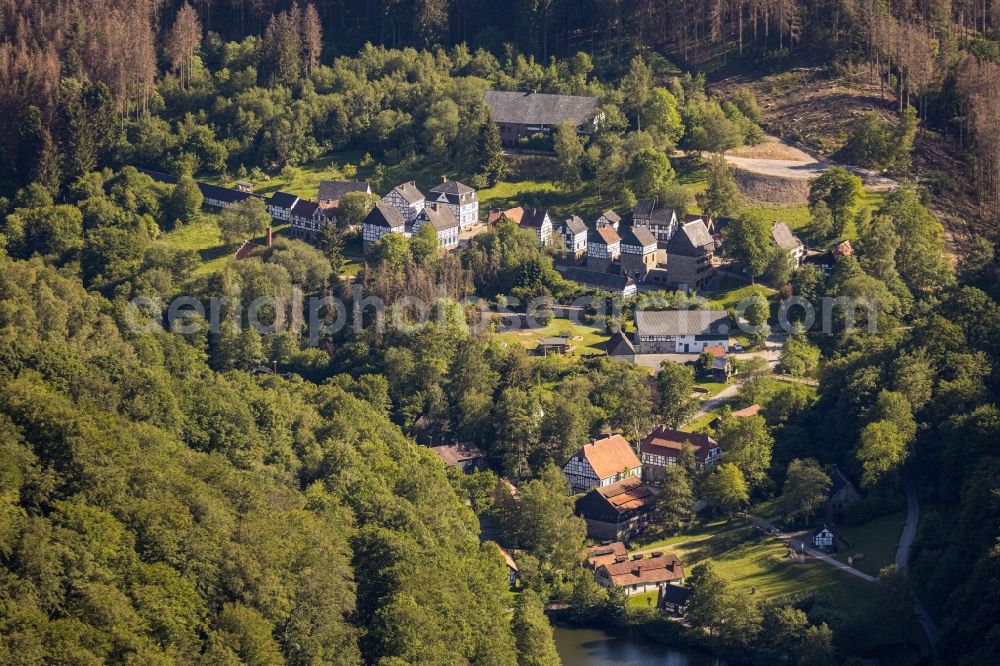 Hagen from above - Surrounded by forest and forest areas center of the streets and houses and residential areas in the district Dahl in Hagen in the state North Rhine-Westphalia, Germany