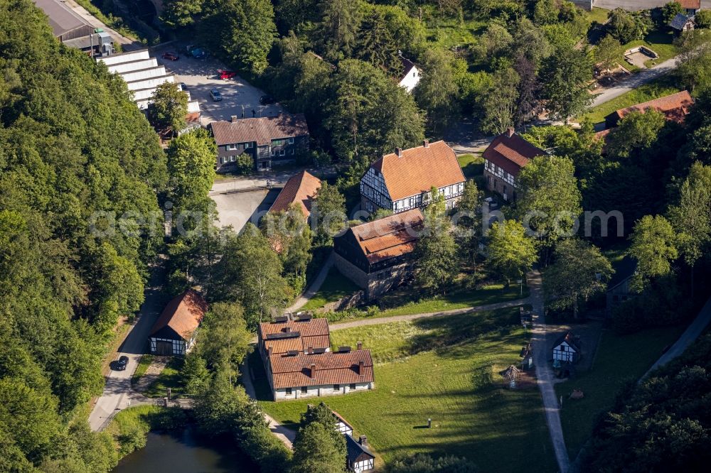 Aerial photograph Hagen - Surrounded by forest and forest areas center of the streets and houses and residential areas in the district Dahl in Hagen in the state North Rhine-Westphalia, Germany