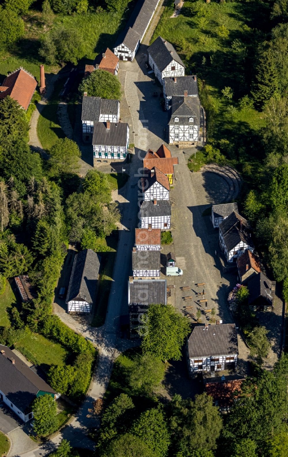 Aerial image Hagen - Surrounded by forest and forest areas center of the streets and houses and residential areas in the district Dahl in Hagen in the state North Rhine-Westphalia, Germany