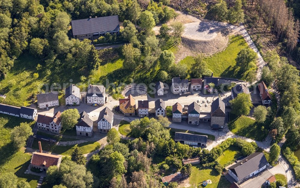 Aerial photograph Hagen - Surrounded by forest and forest areas center of the streets and houses and residential areas in the district Dahl in Hagen in the state North Rhine-Westphalia, Germany