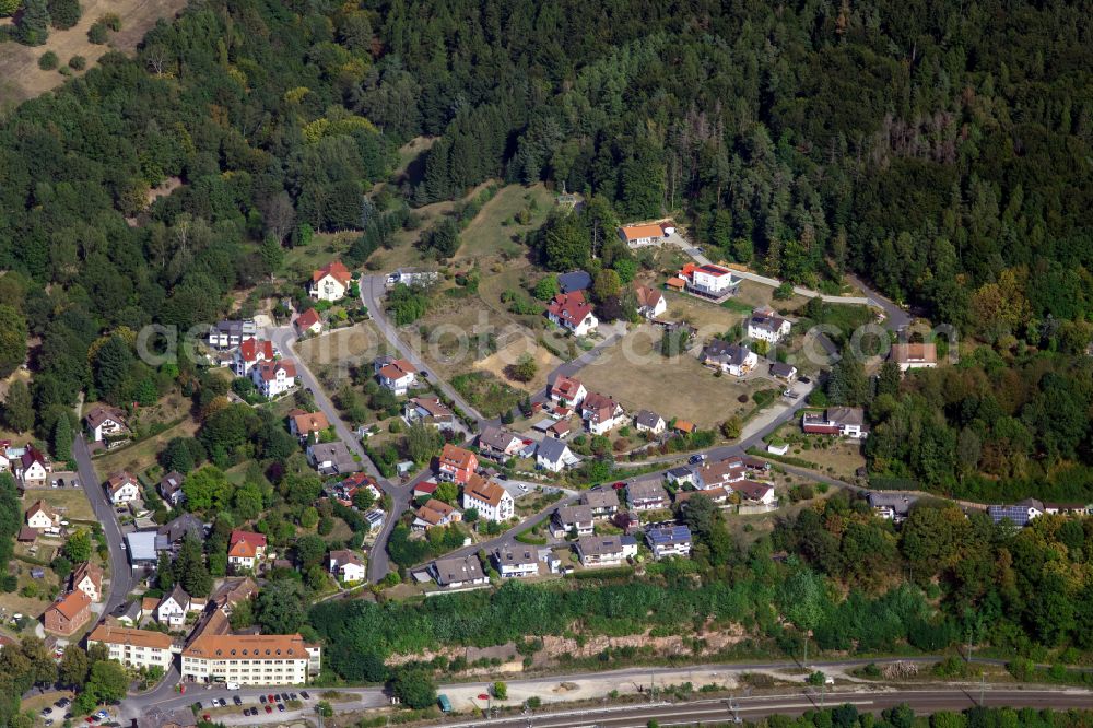 Partenstein from above - Surrounded by forest and forest areas center of the streets and houses and residential areas in Partenstein in the state Bavaria, Germany