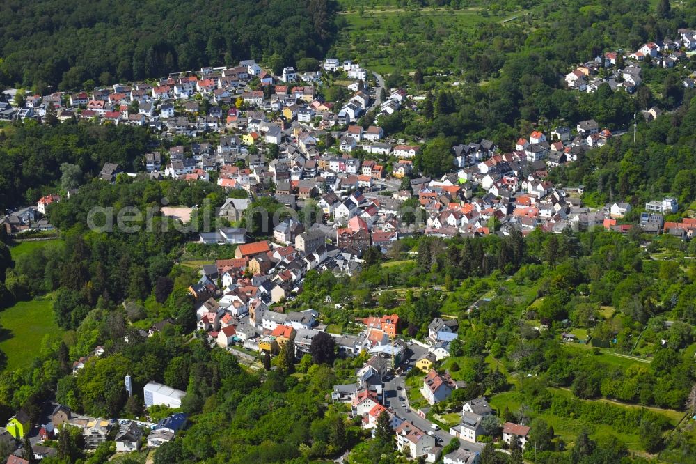 Aerial image Rambach - Surrounded by forest and forest areas center of the streets and houses and residential areas in Rambach in the state Hesse, Germany