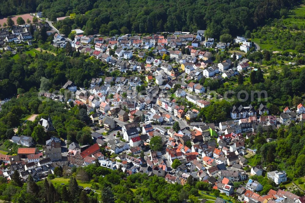 Rambach from above - Surrounded by forest and forest areas center of the streets and houses and residential areas in Rambach in the state Hesse, Germany