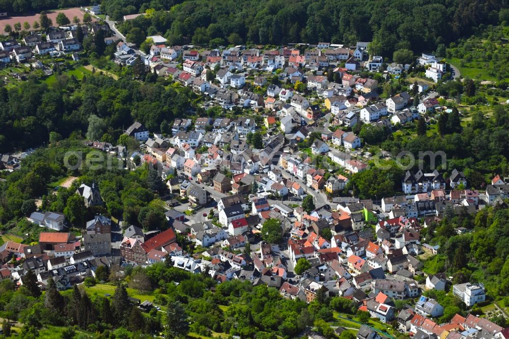 Rambach from the bird's eye view: Surrounded by forest and forest areas center of the streets and houses and residential areas in Rambach in the state Hesse, Germany