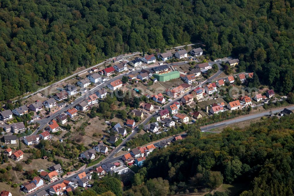 Rechtenbach from the bird's eye view: Surrounded by forest and forest areas center of the streets and houses and residential areas in Rechtenbach in the state Bavaria, Germany