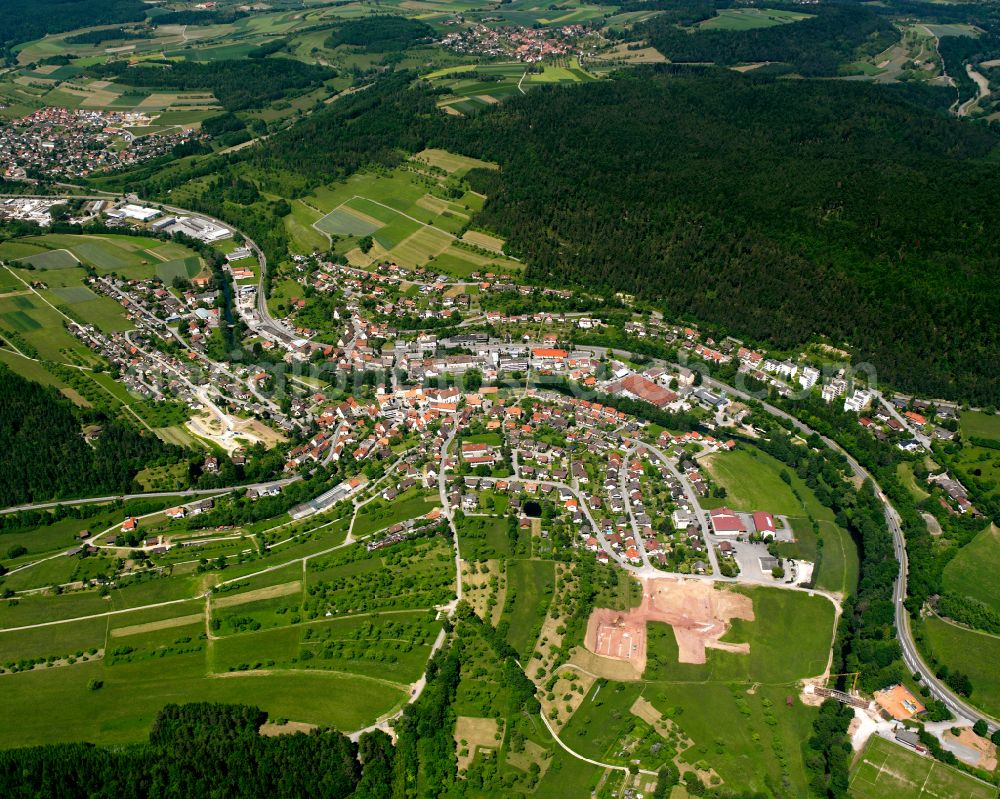 Rohrdorf from above - Surrounded by forest and forest areas center of the streets and houses and residential areas in Rohrdorf in the state Baden-Wuerttemberg, Germany