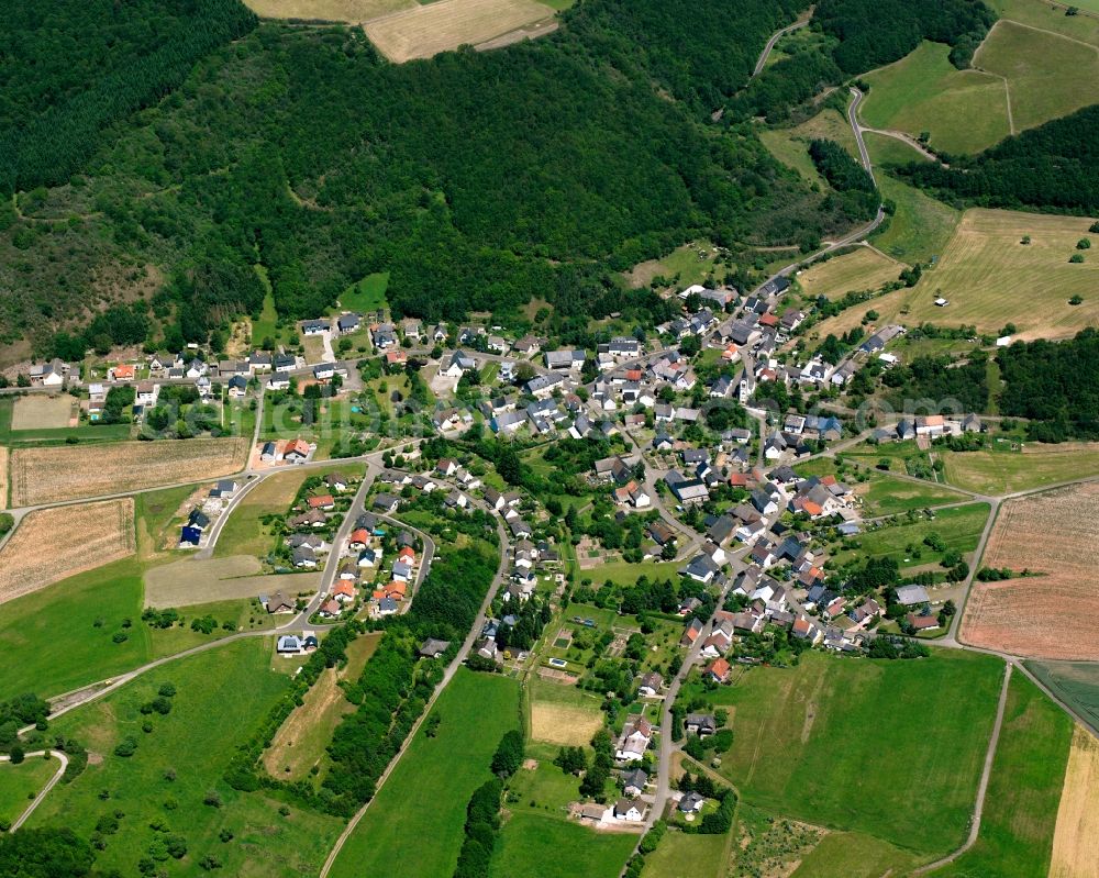 Schmidthachenbach from above - Surrounded by forest and forest areas center of the streets and houses and residential areas in Schmidthachenbach in the state Rhineland-Palatinate, Germany