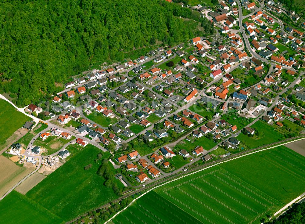 Aerial image Schmiechen - Surrounded by forest and forest areas center of the streets and houses and residential areas in Schmiechen in the state Baden-Wuerttemberg, Germany