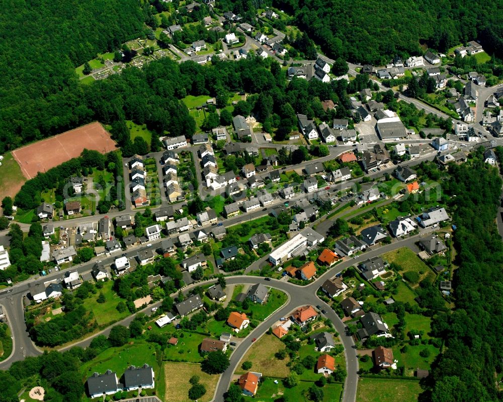 Aerial photograph Tiefenstein - Surrounded by forest and forest areas center of the streets and houses and residential areas in Tiefenstein in the state Rhineland-Palatinate, Germany