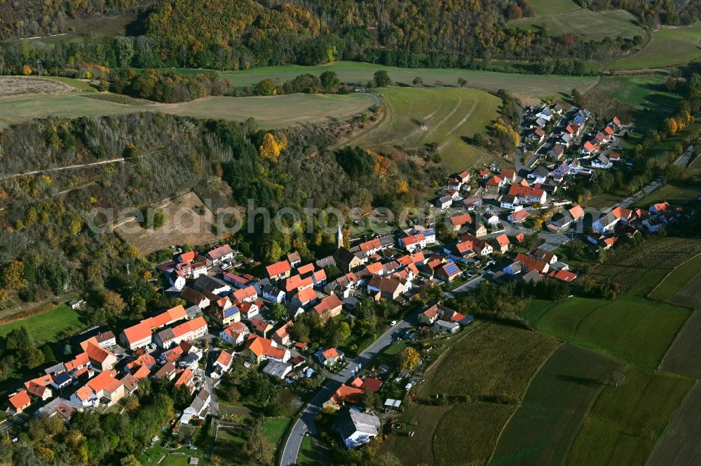 Unkenbach from the bird's eye view: Surrounded by forest and forest areas center of the streets and houses and residential areas in Unkenbach in the state Rhineland-Palatinate, Germany