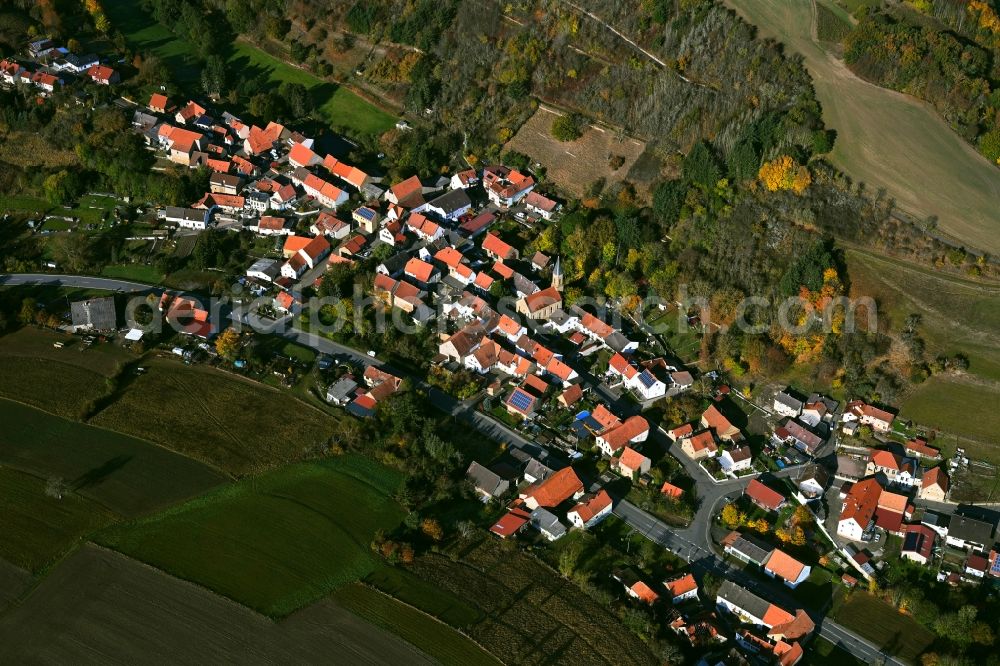 Unkenbach from above - Surrounded by forest and forest areas center of the streets and houses and residential areas in Unkenbach in the state Rhineland-Palatinate, Germany