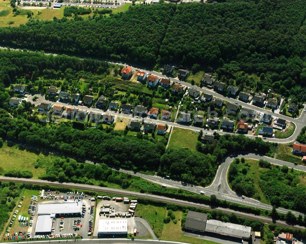 Aerial photograph Weierbach - Surrounded by forest and forest areas center of the streets and houses and residential areas in Weierbach in the state Rhineland-Palatinate, Germany