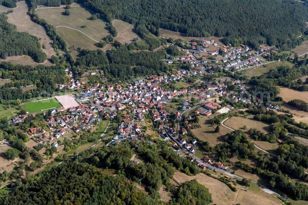 Aerial image Wiesthal - Surrounded by forest and forest areas center of the streets and houses and residential areas in Wiesthal in the state Bavaria, Germany