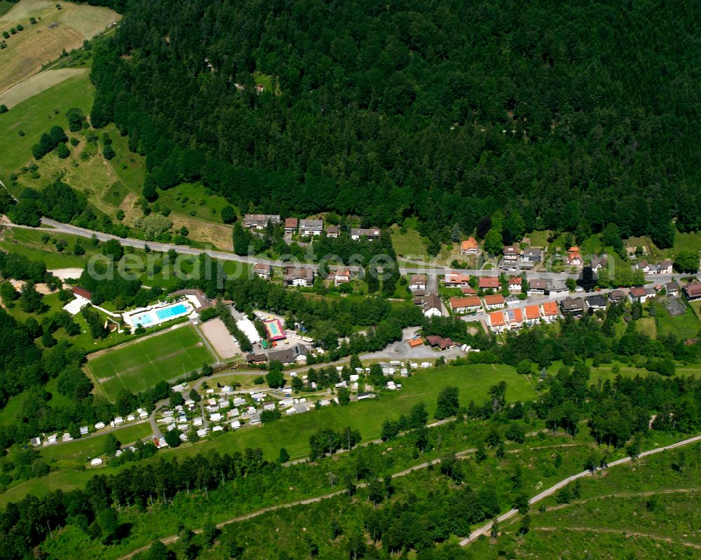 Aerial image Bad Herrenalb - Urban area with outskirts and inner city area surrounded by woodland and forest areas in Bad Herrenalb at Schwarzwald in the state Baden-Wuerttemberg, Germany